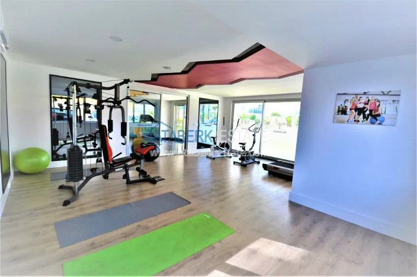 Трехкомнатная квартира в современном комплексе Махмутлара 13 