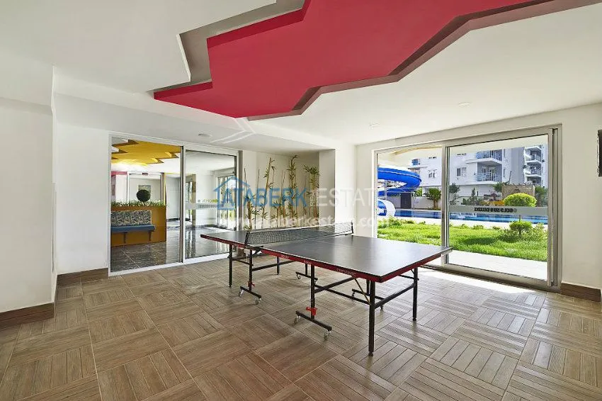 Трехкомнатная квартира в современном комплексе Махмутлара 18 