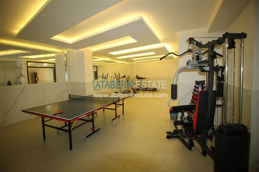 Уютная квартира в современном комплексе района Махмутларе 13 