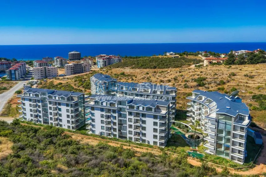 Комплекс с инфраструктурой отеля в районе университета и русской школы в Алании 1 