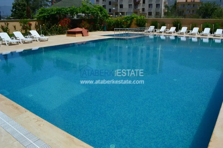 Квартира большой площади в прекрасном жилом комплексе в Махмутларе 12 