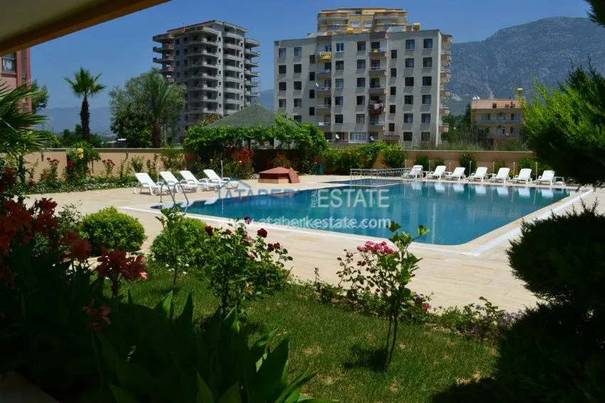 Квартира большой площади в прекрасном жилом комплексе в Махмутларе 14 