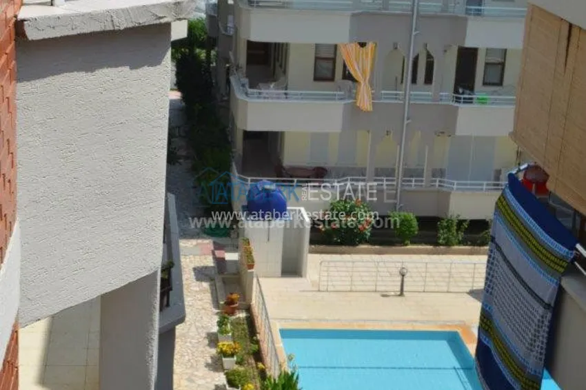 Квартира большой площади в прекрасном жилом комплексе в Махмутларе 32 