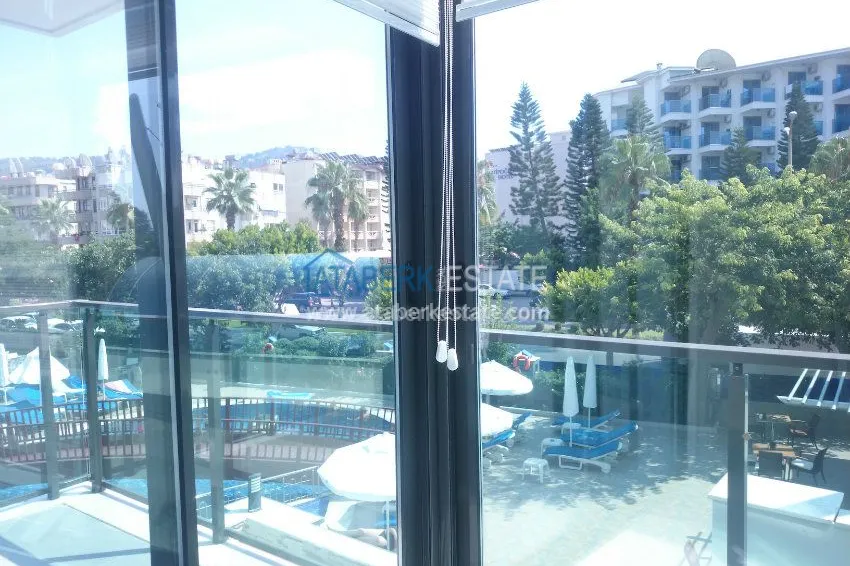 Новая квартира в центре Махмутлара в ухоженном жилом комплексе 27 