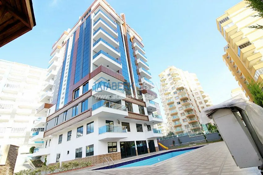 Новая квартира 2+1 в новом доме в Махмутларе от собственника 13 