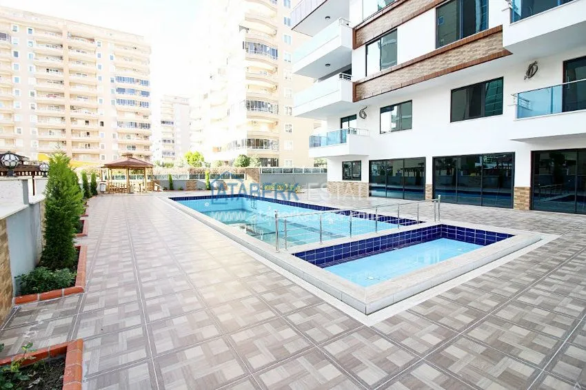 Новая квартира 2+1 в новом доме в Махмутларе от собственника 14 