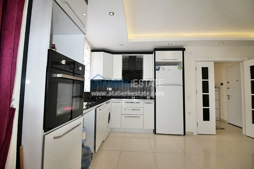 Просторная квартира 1+1 в районе Махмутлар 14 