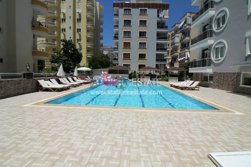 Просторная квартира 1+1 в районе Махмутлар 28 