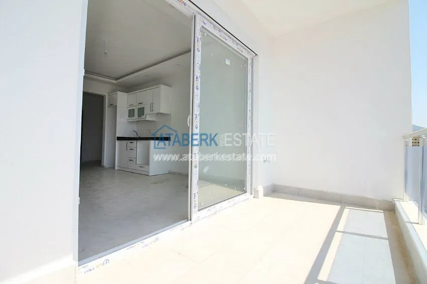 Квартира-студия в районе Махмутлар 19 