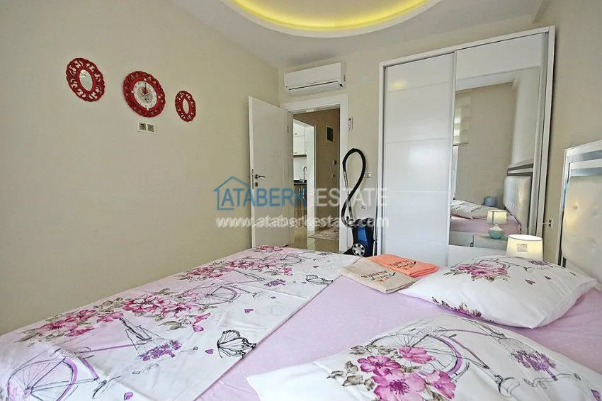 Квартира 1+1 в современном комплексе в Махмутларе 10 