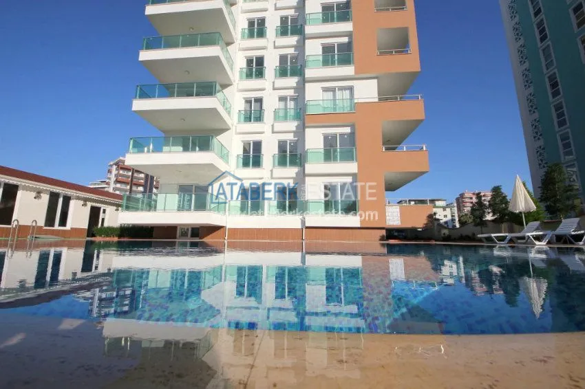 Апартаменты 1+1 в  современном комплексе от надежного застройщика в районе Махмутлар 13 