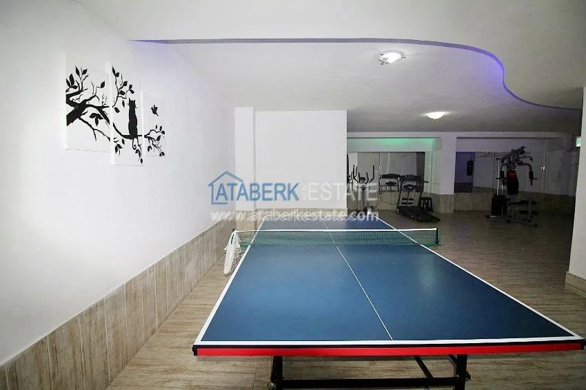 Меблированные апартаменты 1+1 в районе Махмутлар 4 