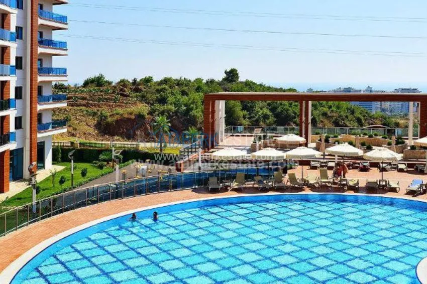 Апартаменты 1+1 в роскошном комплексе с собственным пляжем в Алании 12 