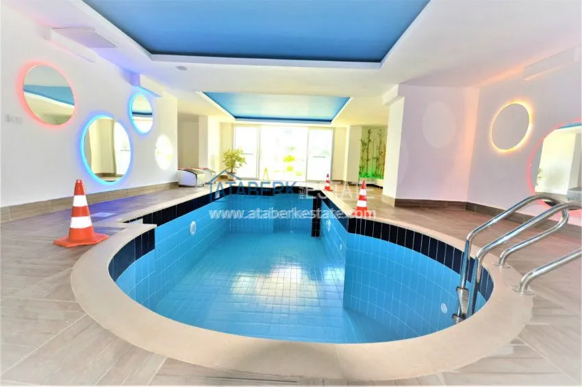 Трехкомнатная квартира в современном комплексе Махмутлара 22 