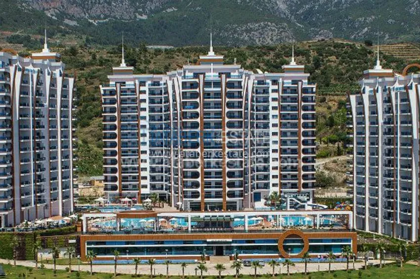 Апартаменты 1+1 в роскошном комплексе в районе Махмутлар 10 