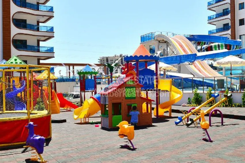 Апартаменты 1+1 в роскошном комплексе в районе Махмутлар 16 