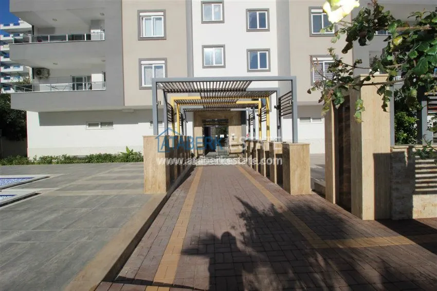 Уютная квартира в современном комплексе района Махмутларе 16 